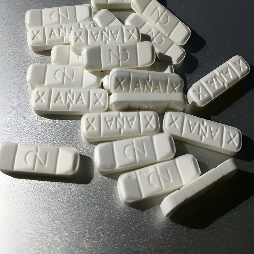 Таблетки Алпразолам (Ксанакс) в форме белых брусков — дозировки и правила приема